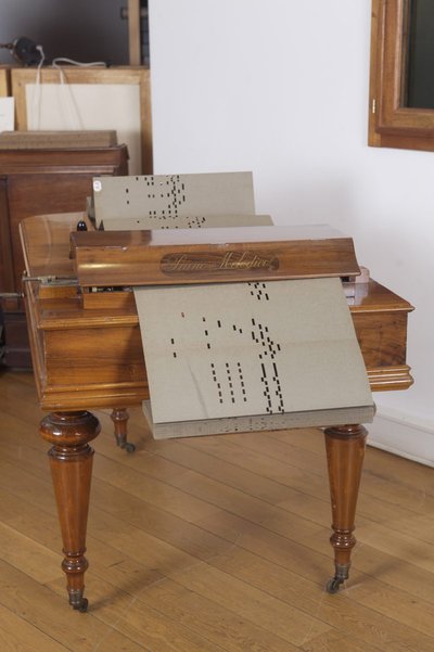 Piano melodico à queue