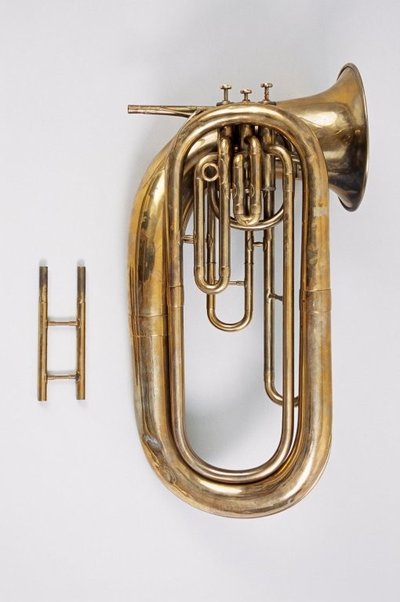 Contrabass cornophone. Nominal pitch: 13-ft E♭ / 14-ft D.